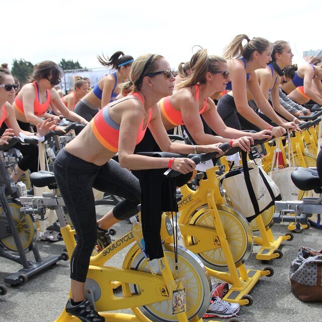An outdoor spin cycle class by SoulCycle.
