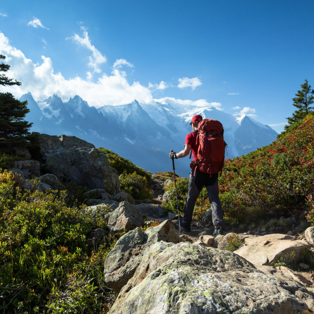 A man hiking on the famous Tour du Mont Blanc near Chamonix, France.