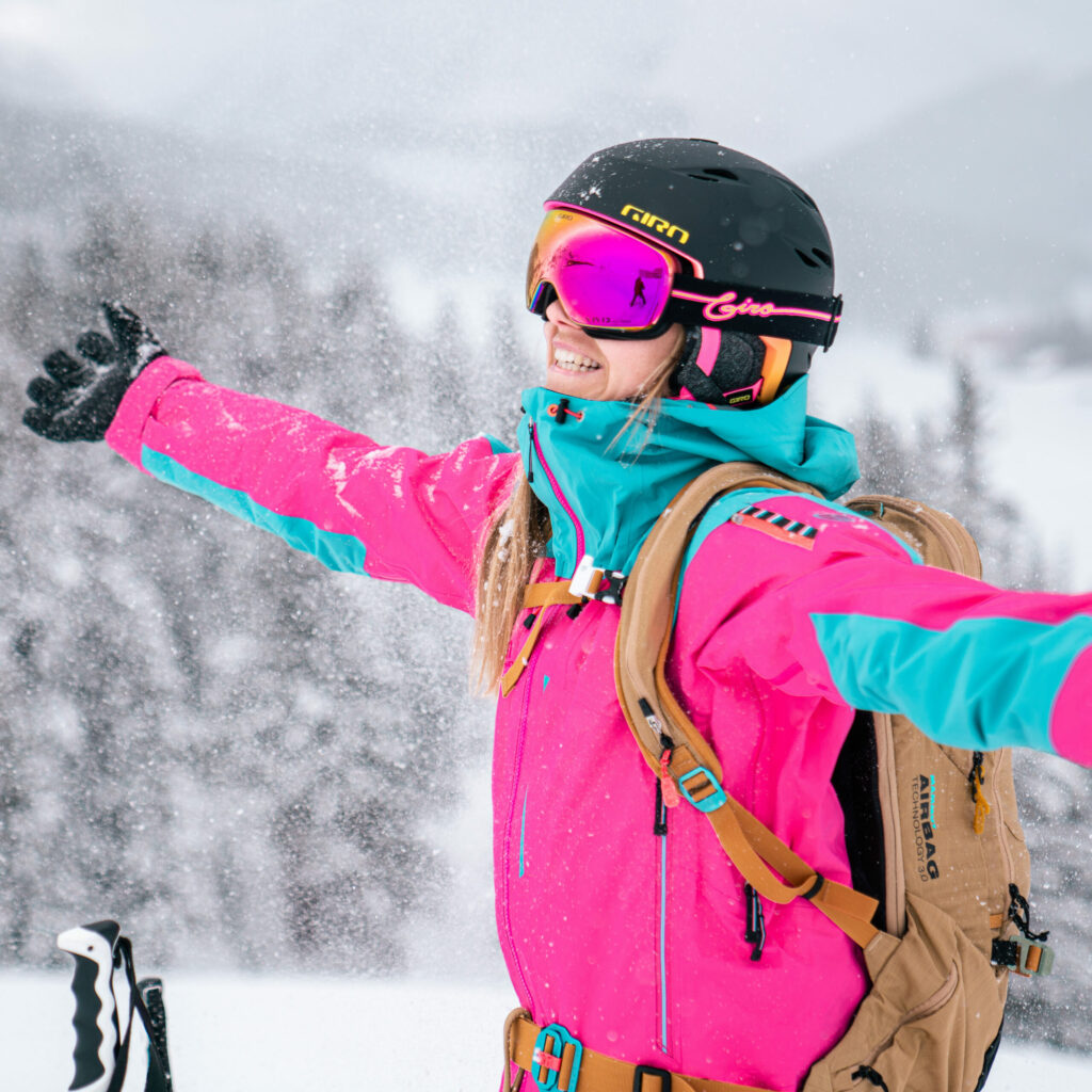 A female skier wearing a Giro helmet and goggles.