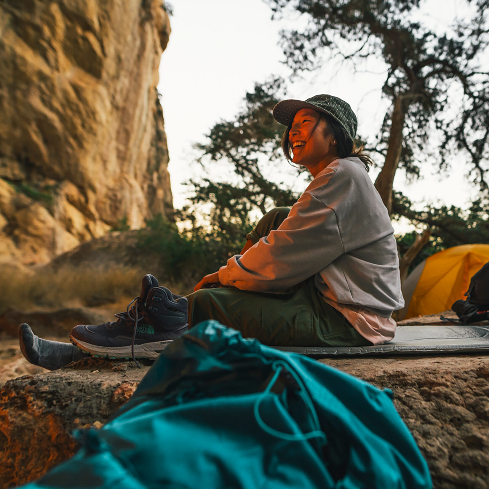 A hiker with hiking socks relaxing after a long day.