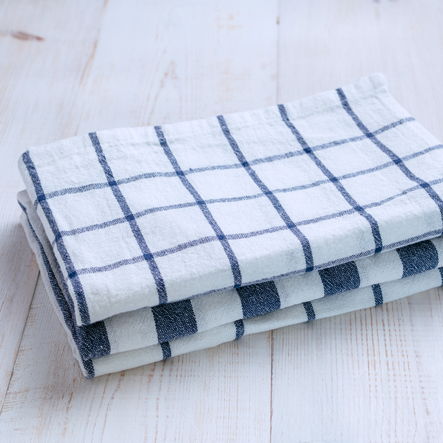 Dish towels can be used to help store knifes or other sharp objects.