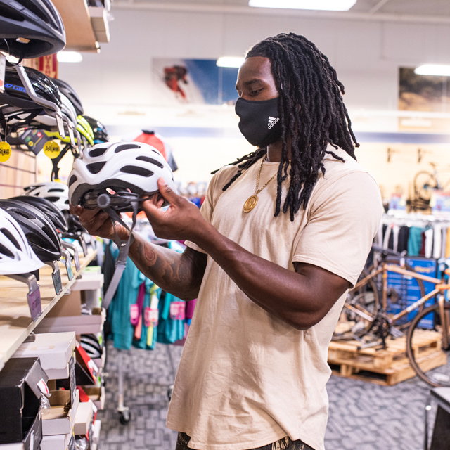 Jaylon Smith checking out a Giro helmet.
