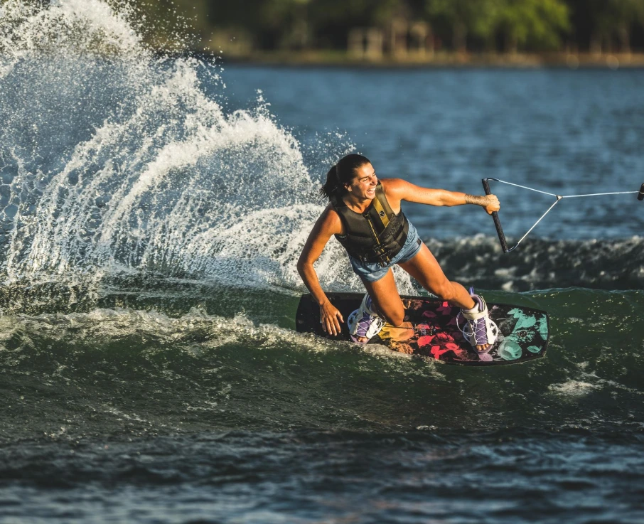 Knee boarding on lake