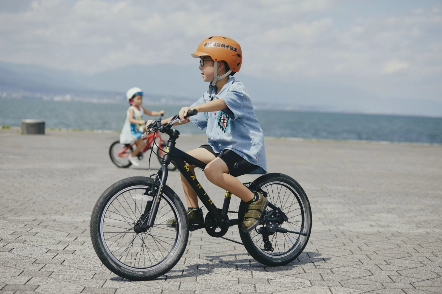 child biking to school