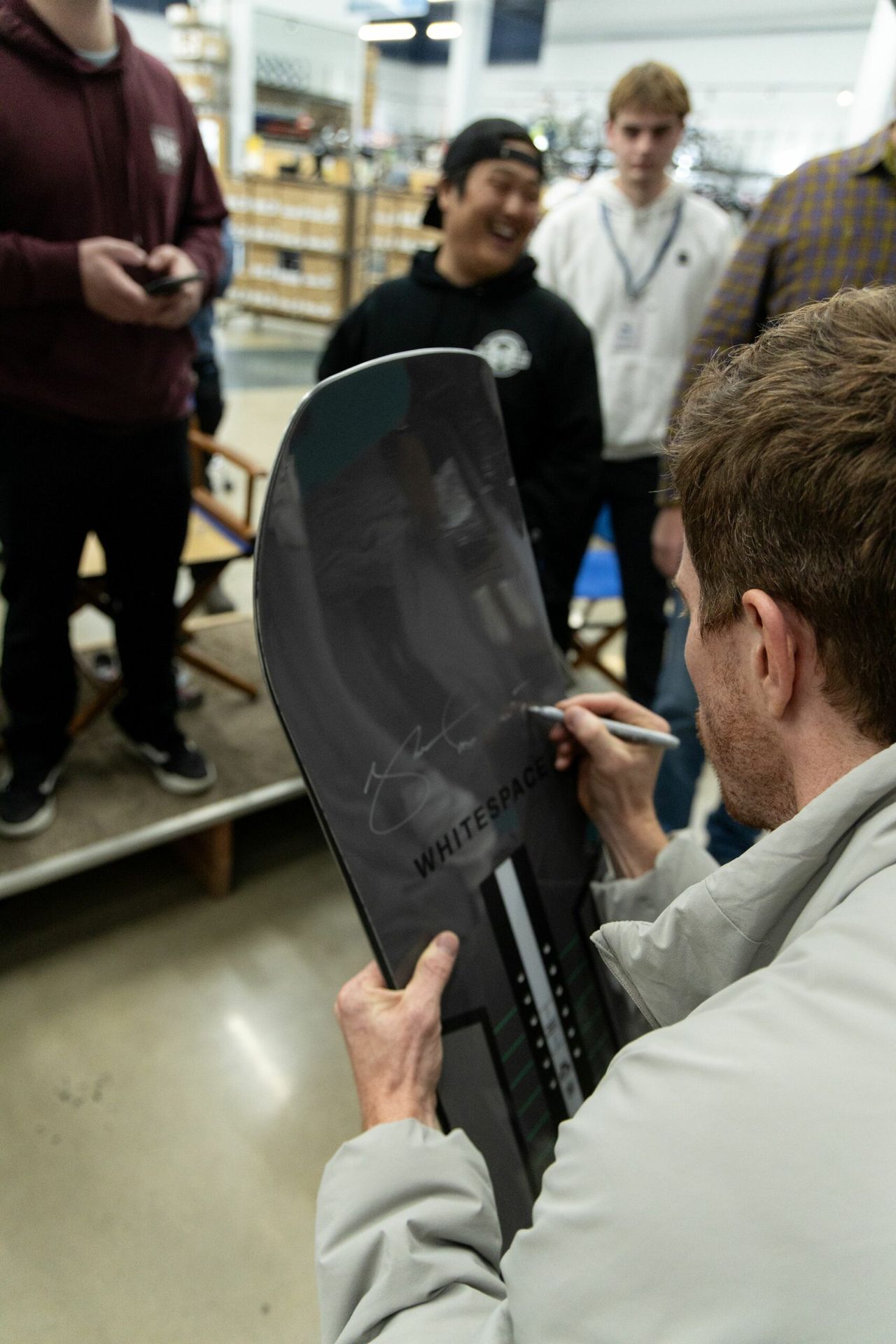 Shaun White signing gear at Sun & Ski Sports.