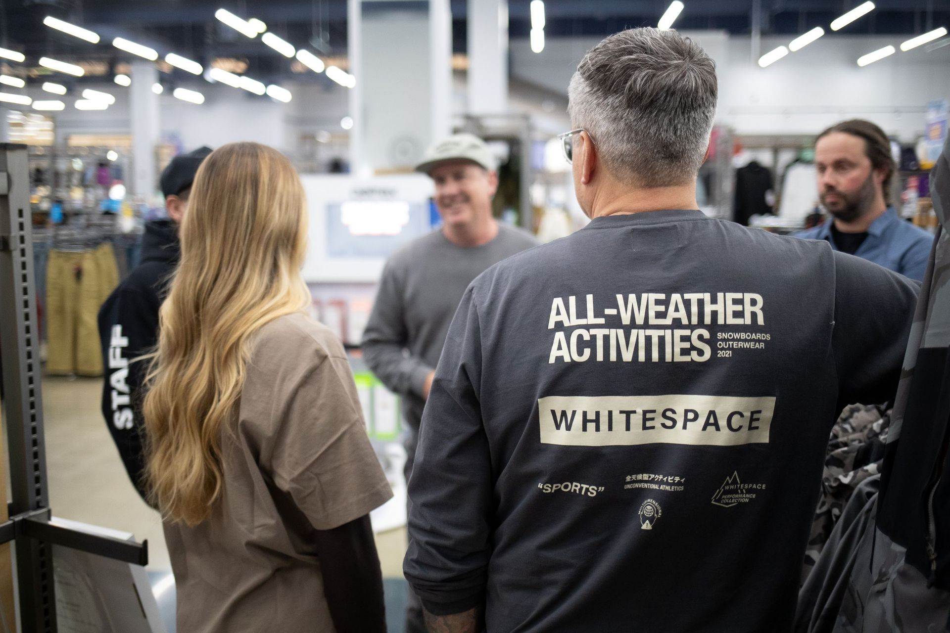 Group of Outdoor Experts at Sun & Ski Sports during the Whitespace clinic with Shaun White introducing the Whitespace apparel brand.