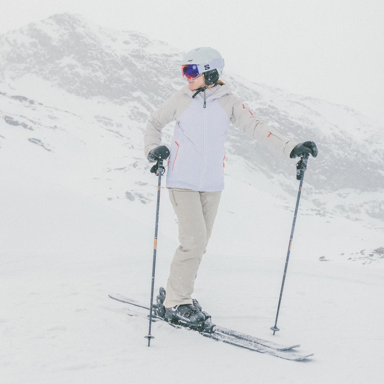 The classic skier enjoying the slopes.