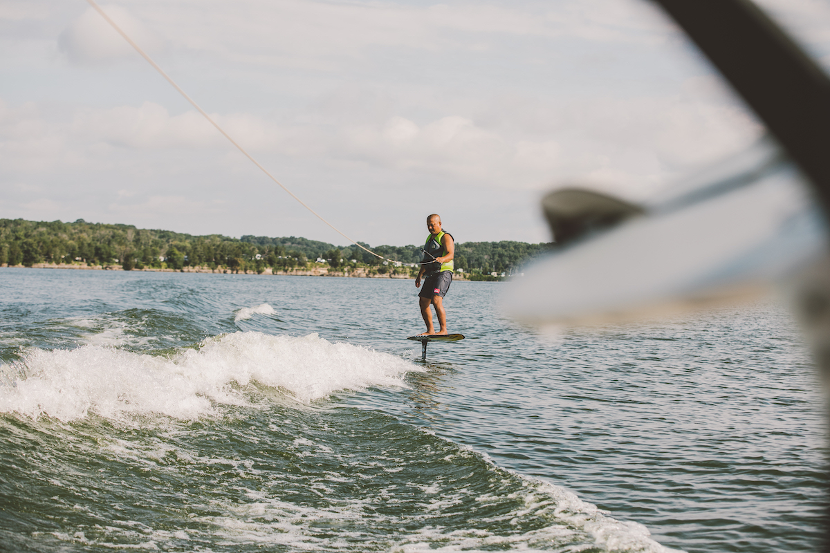 man wake foiling on lake