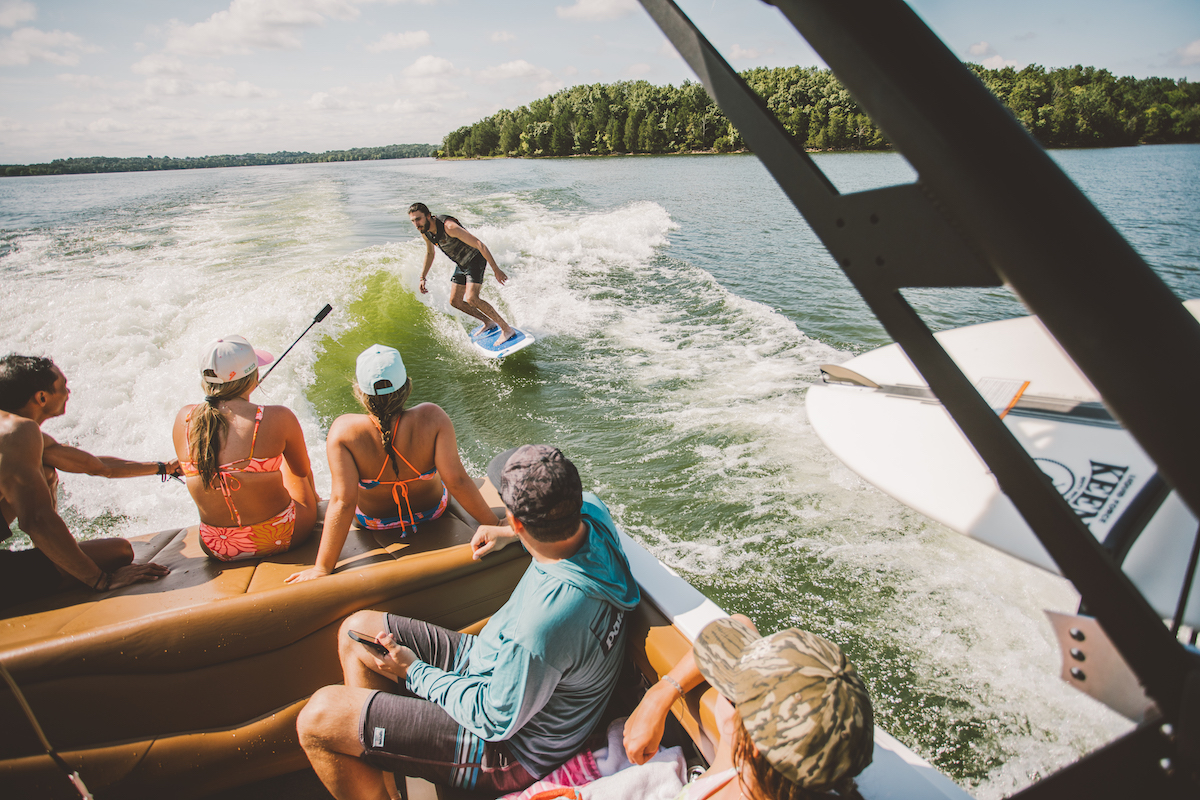 man wake surfing