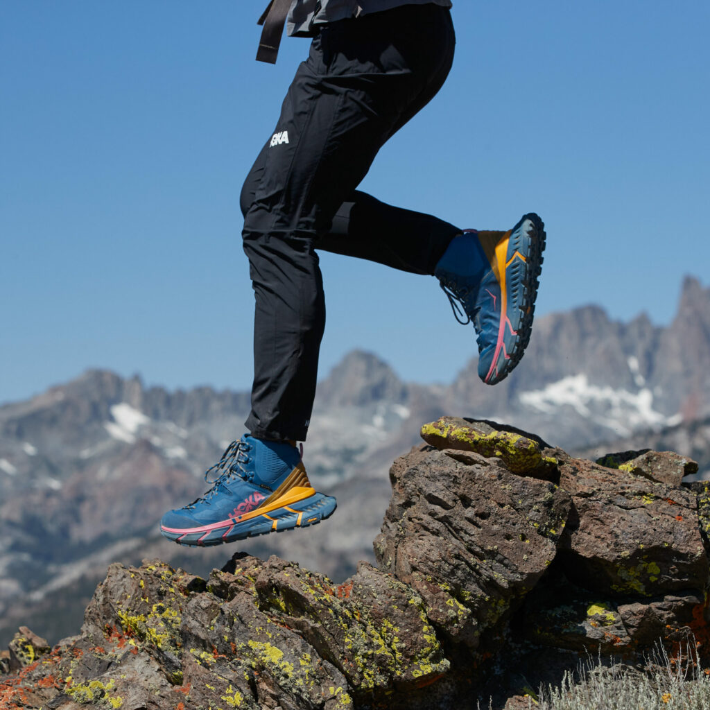 Someone running on mountain trails.