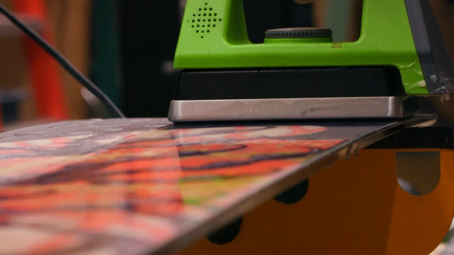 Snowboard tuning services at Sun & Ski Sports snowboard shop