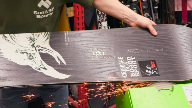 Snowboard waxing services at Sun & Ski Sports snowboard shop