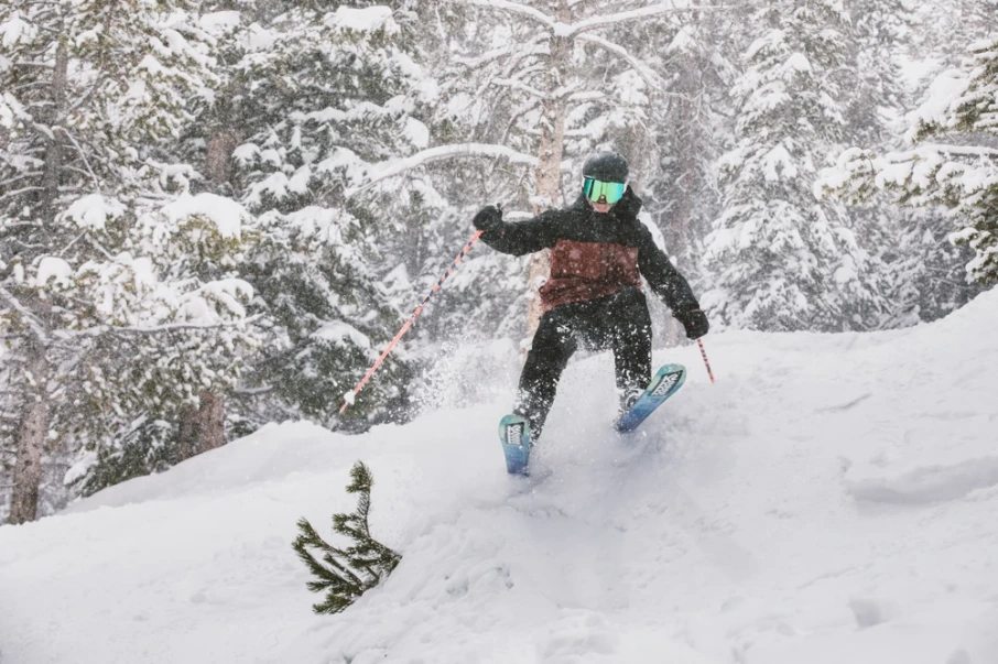Man skiing through fresh powder